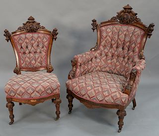 Two Renaissance Revival walnut chairs attributed to John Jelliff,  including a gentleman's chair and a side chair with carved female...