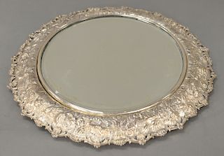 Round Kirk & Son sterling silver mirror plateau with all over repousse, marked: S Kirk & sons Sterling 3494. 
height 1 inches, diame...