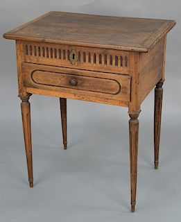 Louis XVI work table, lift-top and one drawer on turned legs. 
height 30 1/4 inches, top: 17 3/4" x 25 1/4"