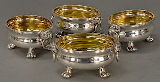 Paul Storr (1771-1844) set of four open salts,  oval form with ribbed top edge and lion masks with ring handles, set on claw feet wi...