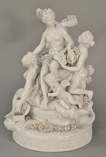 Large Capodimonte white glazed figural porcelain group having four nude women and two putti with wreaths of flowers and two doves, m...