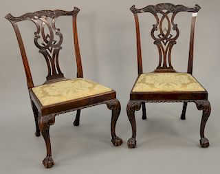 Pair of George II mahogany side chairs, 
with pierced carved backs and ball and claw feet, 18th century. 
seat height 17 inches, tot...