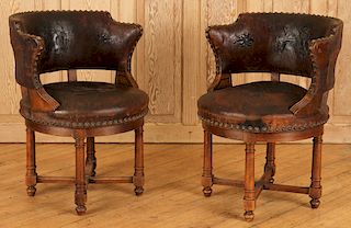 PAIR EMBOSSED LEATHER WALNUT SWIVEL CHAIRS C.1900