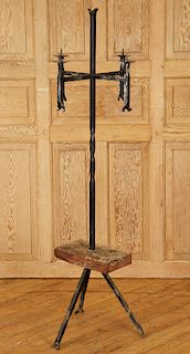 A WROUGHT IRON AND WOOD THREE LIGHT TORCHIERE