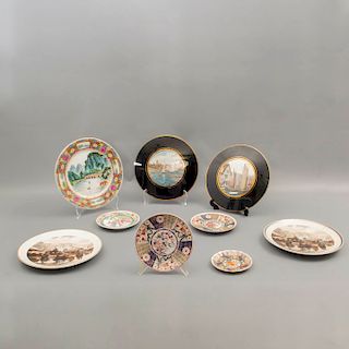 Lote de 9 platos decorativos. Diferentes orígenes. Siglo XX. Elaborados en porcelana. Decorados con elementos florales, fitomorfos.