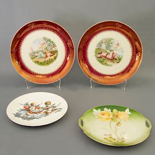 Lote de 4 platos decorativos. Alemania. Siglo XX. Elaborados en porcelana. 3 Bavaria y una Thomas. Decorados con elementos florales.
