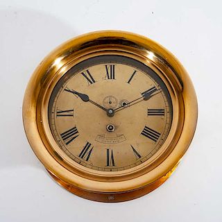 Reloj de pared Waltham. Estados Unidos, siglo XIX. Star Brass MF6. Co. Boston Mass. Elaborado en latón y cobre, con llave.