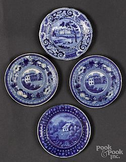 Four blue Staffordshire cup plates