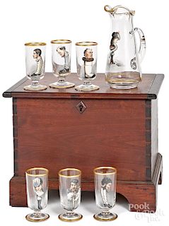 Walnut cellarette with a pitcher and six glasses