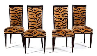 A Set of Four Art Deco Style Black Lacquer Dining Chairs Height 41 x width 19 1/2 x depth 20 1/2 inches.