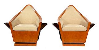 A Pair of Art Deco Birch Veneer Swivel Club Chairs Height 38 x width 40 1/2 inches.