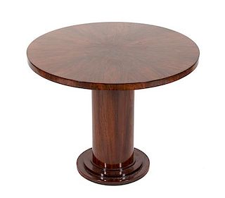 An Art Deco Style Rosewood Veneered Side Table Height 21 1/2 x diameter 27 1/2 inches.