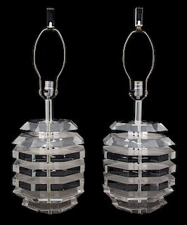 A Pair of Modern Lucite Lamps Height 28 1/2 x diameter 10 inches.