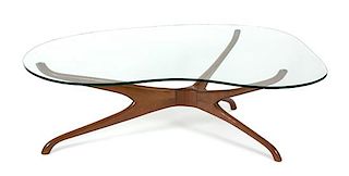 A Trisymmetric Walnut and Glass Coffee Table Height 15 1/2 x width 48 x depth 34 inches.