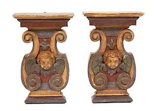 A Pair of Italian Carved and Polychromed Wood Wall Brackets Height 18 1/2 inches.
