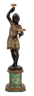 A Venetian Polychrome and Gilt Decorated Blackamoor Height 66 inches.