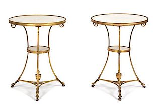 A Pair of Louis XVI Style Gilt Bronze and White Marble Gueridons Height 27 1/2 x diameter of top 20 3/4 inches.