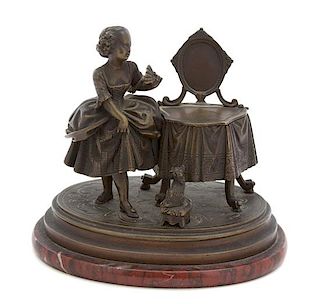 A French Bronze Figural Inkwell Height 5 1/2 x width 6 x depth 4 inches.