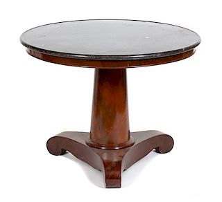 A Napoleon III Mahogany Marble Top Table Height 29 x diameter 38 1/4 inches.