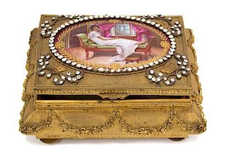 A French Gilt Bronze Jeweled Box with Oval Portrait Miniature Height 3 x width 6 1/8 x depth 5 inches.