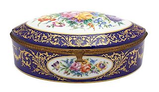 A French Hand Painted Porcelain Gilt Metal Mounted Oval Box Height 4 3/4 x width 14 x depth 10 1/4 inches.