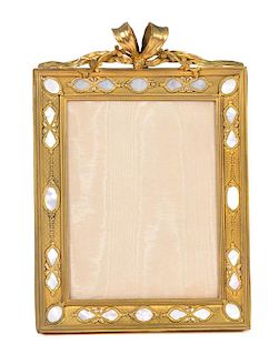A French Gilt Bronze and Mother-of-Pearl Inset Easel Back Frame Height 14 1/2 x width 10 inches.