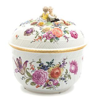 A Ludwigsburg Hard Paste Porcelain Lidded Tureen Height 16 x diameter 11 1/2 inches.