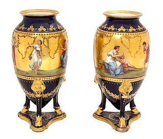 A Pair of Royal Vienna Hand Painted Porcelain Vases Height 7 1/2 x daimeter 3 3/4 inches.