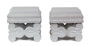 A Pair of Continental White Glazed Ceramic Stools Height 16 1/2 x width 16 1/2 x depth 12 1/2 inches.