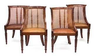 A Set of Eleven Regency Style Carved Mahogany and Caned Dining Chairs Height 34 inches.
