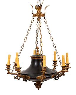 A Regency Gilt Bronze and Black Tole Eight Light Chandelier Height 18 x diameter 20 inches.