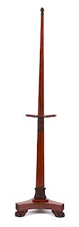 A Regency Carved Mahogany Painting Easel Height 81 x diameter of base 18 inches.