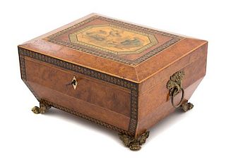 A Regency Inlaid Amboyna and Penwork Sewing Box Height 6 x width 11 x depth 9 inches.