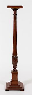 A Regency Style Mahogany Pedestal Height 50 1/2 x diameter squared 10 inches.