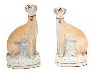 A Pair of Staffordshire Porcelain Models of Greyhounds Height 8 x width 4 1/2 inches.