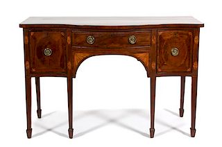 A Hepplewhite Serpentine Front Mahogany Sideboard Height 35 1/2 x width 54 1/8 x depth 42 1/4 inches.