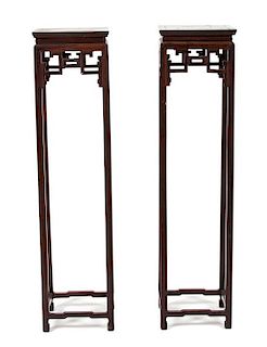 A Pair of Chinese Hardwood Stands Height 53 x width 13 x depth 13 inches.