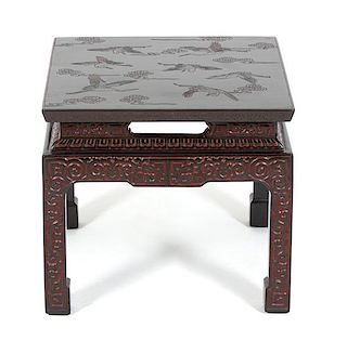 A Chinese Carved Black and Red Lacquer Side Table Height 16 x width 17 3/4 x depth 17 3/4 inches.