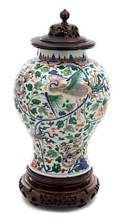 A Chinese Five-Color Porcelain Jar Height of jar 13 (overall 20) x diameter 9 inches.