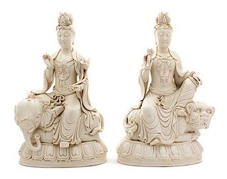 A Pair of Chinese Blanc-de-Chine Porcelain Guan Yin Figures Height 20 1/4 inches.