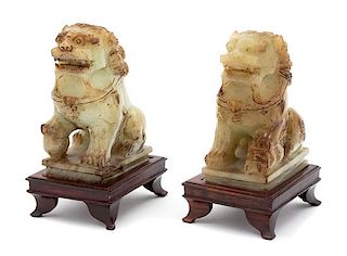 A Pair of Apple Green Jade Foo Lions Height 5 inches.