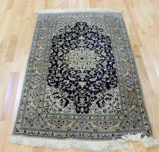 Antique and Finely Hand Woven Persian Silk Carpet.