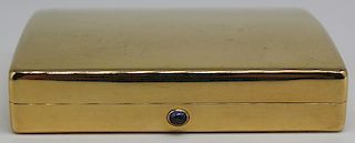 GOLD. Cartier 18kt Gold and Sapphire Hinged Case.