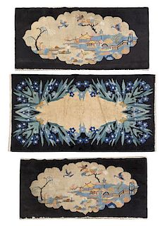 A Pair of Chinese Wool Rugs, Dimensions of first 4 feet 6 3/4 inches x 2 feet 5 1/2 inches.