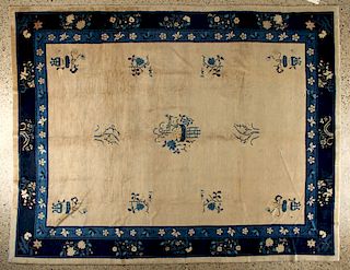 BLUE AND TAN RUG