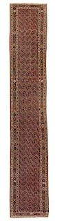 A Northwest Persian Wool Runner, 14 feet 10 inches x 3 feet 2 1/2 inches.