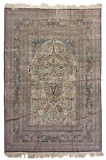 * A Chinese Silk and Wool Rug, 10 feet 1 inch x 7 feet 9 inches.