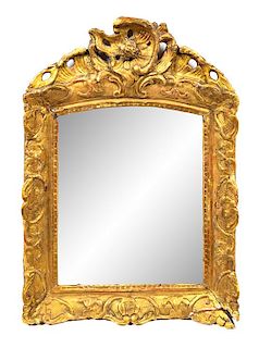 A Regence Giltwood Mirror Height 26 1/8 x width 18 1/4 inches.
