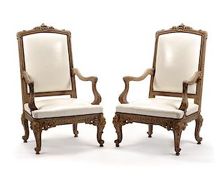 A Pair of Regence Style Carved Fauteuils Height 48 1/2 inches.