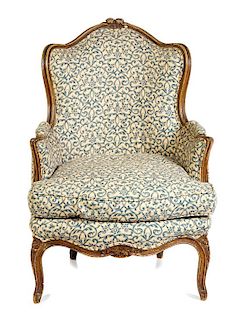 * A Louis XV Painted Bergere Height 40 inches.